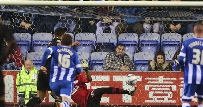 Ali Al-Habsi: Saves the penalty from Sheffield Wednesday's Leon Best