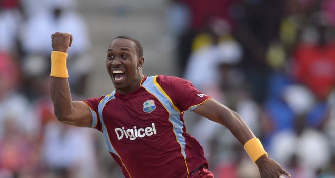 Dwayne Bravo of the West Indies celebrates catching and bowling Joe Root of England during the 2nd One Day International