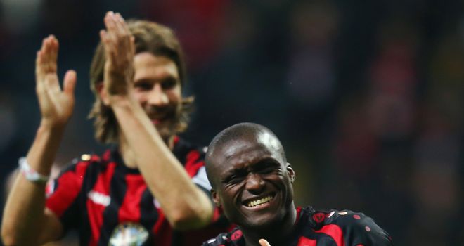 Constant Djakpa (front) and Martin Lanig of Frankfurt celebrate