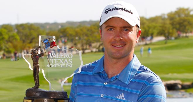 Martin Laird of Scotland holdes the trophy after winning last year's tournament.