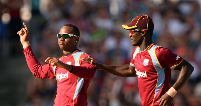 Marlon Samuels (left): West Indies all-rounder hit 69 not out and claimed 2-21