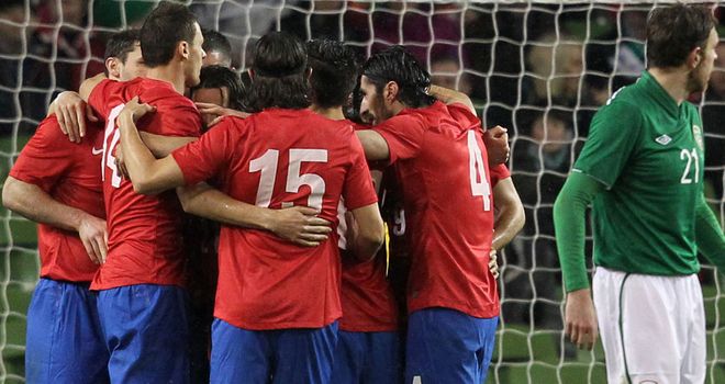 Serbia: Celebrate their equaliser against Republic of Ireland