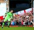 Adrian: Beaten by a spectacular striker from Wayne Rooney