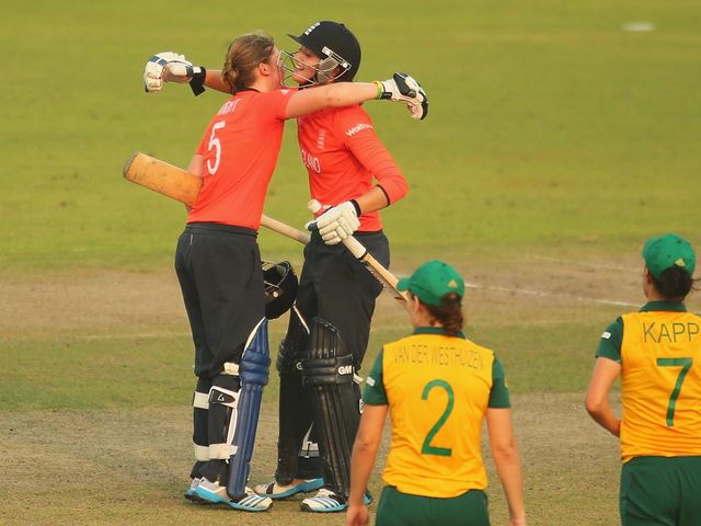 Heather Knight and Sarah Taylor celebrate England's success