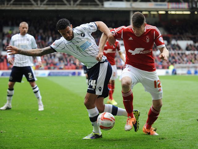 Carlos Edwards and Jamie Mackie tangle