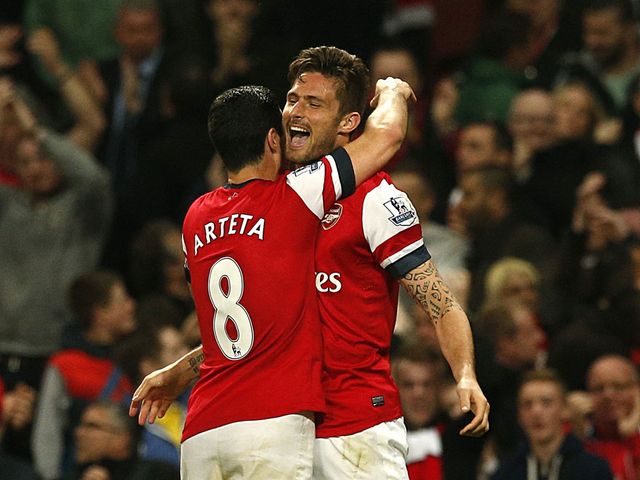 Arteta and Giroud celebrate on Monday