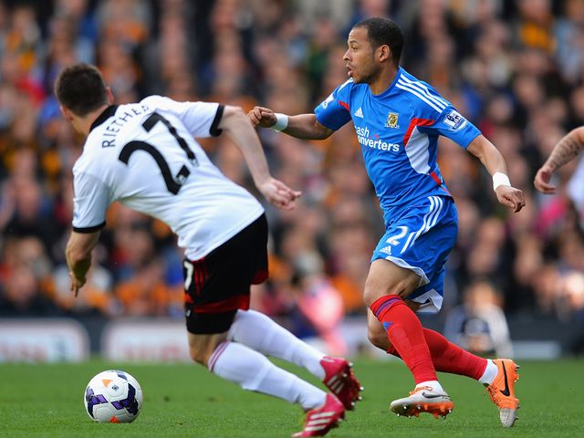 Liam Rosenior of Hull City takes on the Fulham defence