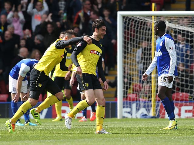 Albert Riera of Watford celebrates with Daniel Tozser