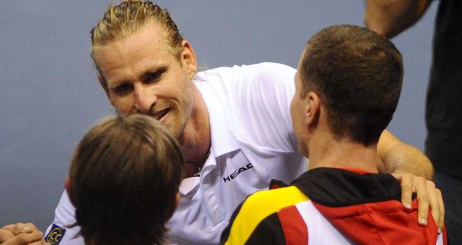 Peter Gojowczyk: Celebrates with his team-mates after stunning victory