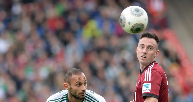 Nuremberg's Josip Drmic and Leverkusen's Oemer Toprak