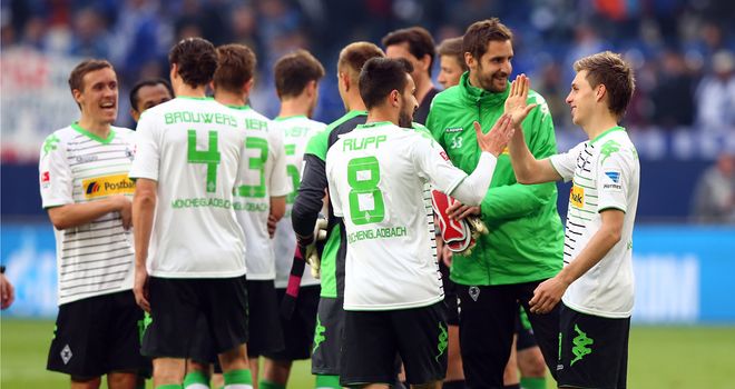Gladbach players celebrate the narrow victory