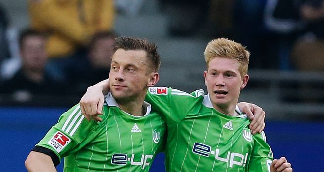Ivica Olic (left) of Wolfsburg celebrates after scoring their first goal