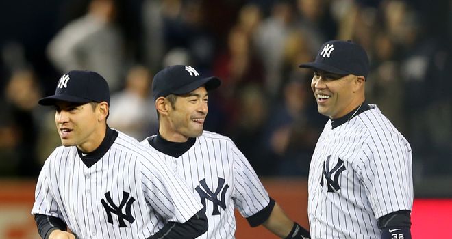 Jacoby Ellsbury,Ichiro Suzuki and Carlos Beltran of the New York Yankees celebrate