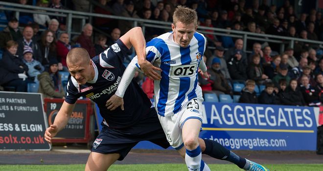 Erik Cikos: Challenges Michael Gardyne in the game at Victoria Park