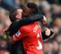 Brendan Rodgers and Raheem Sterling celebrate