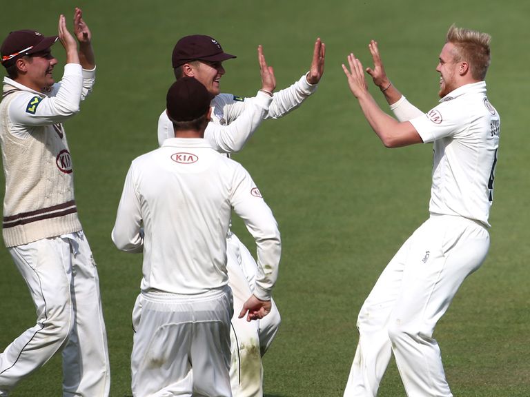 Surrey celebrate one of their wickets against Essex