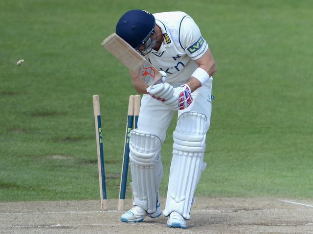 Laurie Evans is clean bowled by Jack Brooks
