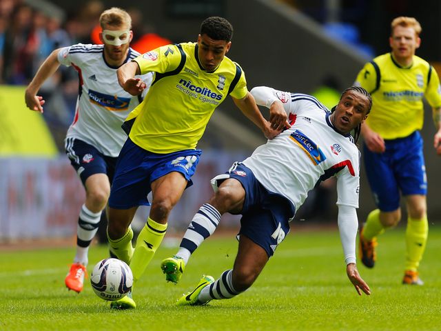 Neil Danns (right): Bagged a brace for Bolton