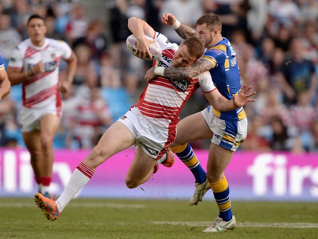 Joe Burgess tries to get away from Zak Hardaker