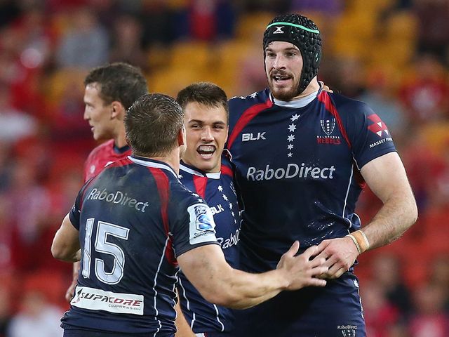 The Rebels celebrate their late winning try