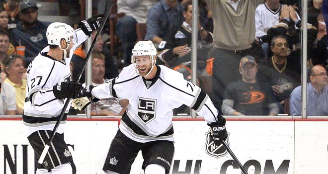 Alec Martinez celebrates his goal for the Kings with Jeff Carter (r)