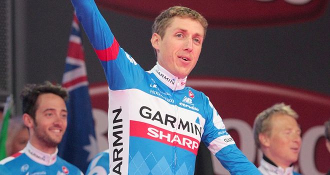 Dan Martin waves to thousands of fans at the Giro d'Italia team presentation in Belfast