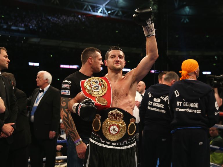 Froch celebrates his stunning victory over Groves