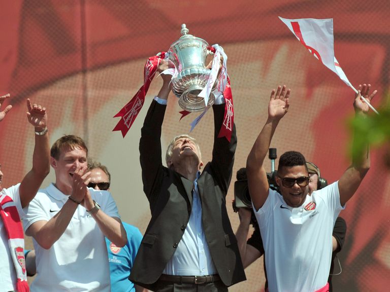 Arsene Wenger celebrates with the FA Cup