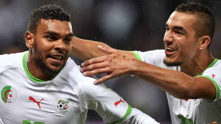 Nabil Bentaleb and El Arabi Soudani: Celebrate after scoring against Romania