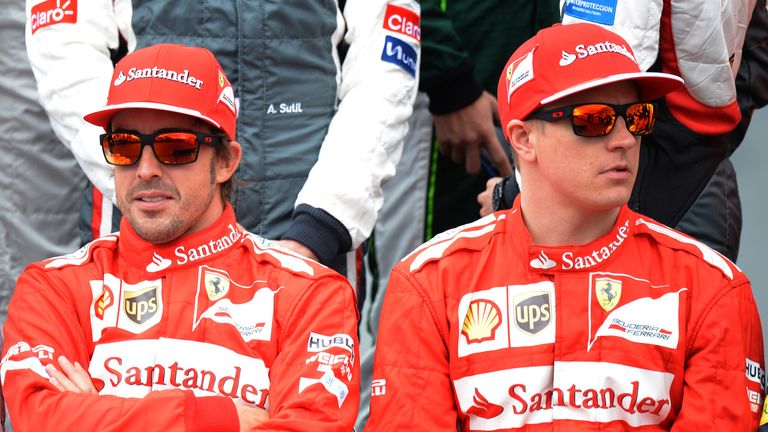 Kimi Raikkonen (right): Slower than team-mate Fernando Alonso