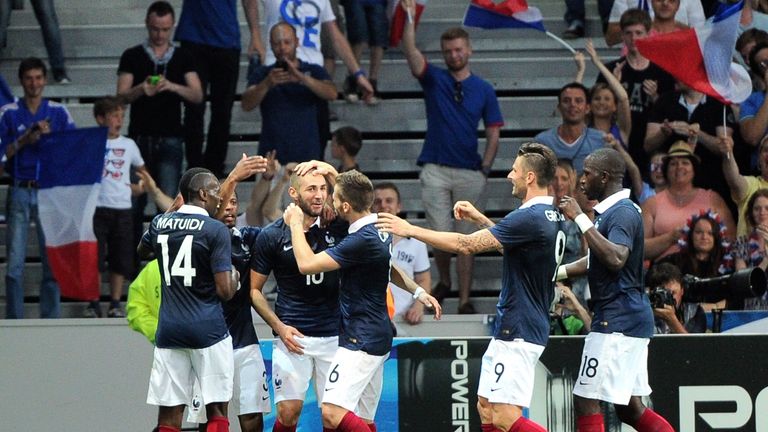 Karim Benzema (centre): Congratulated after scoring in 8-0 win over Jamaica