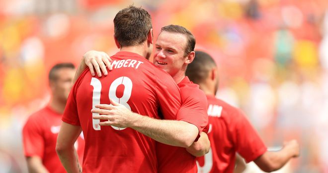 Rickie Lambert and Wayne Rooney: Celebrate during England's 2-2 draw with Ecuador