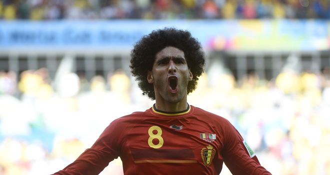 Marouane Fellaini: Celebrates after scoring the equaliser for Belgium