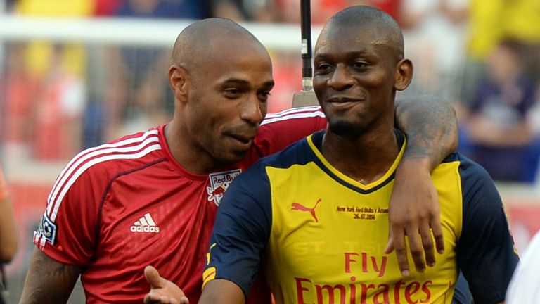 Thierry Henry: Pictured with Abou Diaby after the game