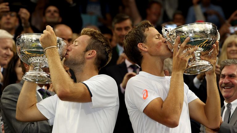 Jack Sock of the United States (left) and Vasek Pospisil of Canada celebrate