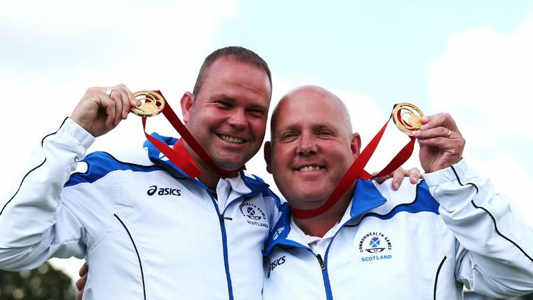 Paul Foster (L) and Alex Marshall (R) celebrate gold after the men's pairs final