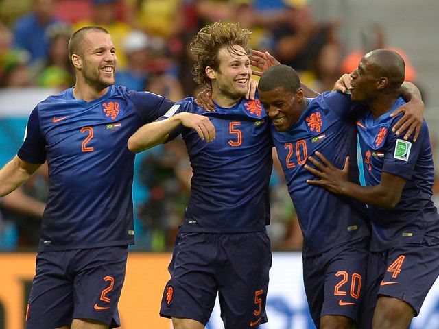 Holland celebrate victory over Brazil