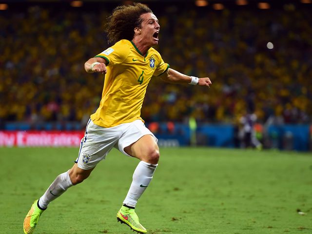 David Luiz celebrates after doubling Brazil's lead in the second half