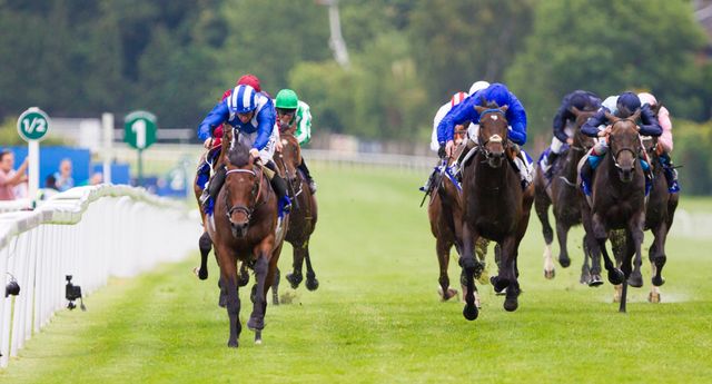 Mukhadram ridden by Paul Hanagan (front left) wins the Coral-Eclipse at Sandown.