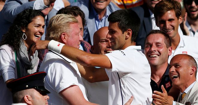 Novak Djokovic hugs Boris Becker after winning Wimbledon this year