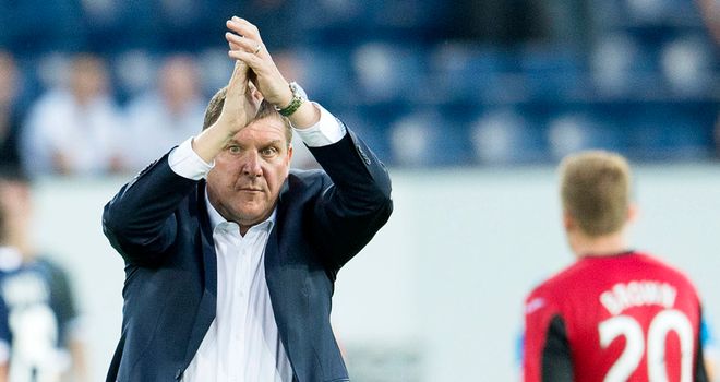 St Johnstone manager Tommy Wright applauds the fans at full-time