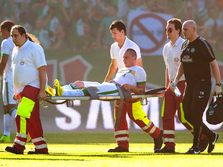 Celtic's Scott Brown is carried off