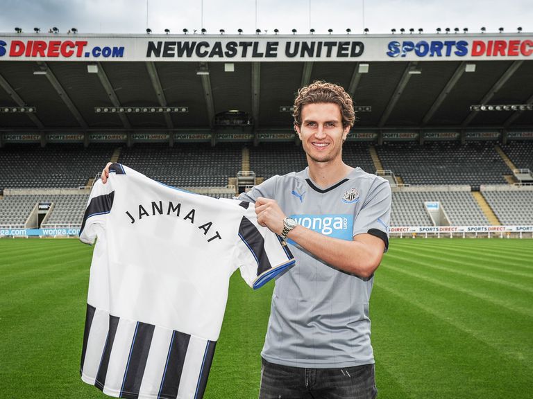Daryl Janmaat poses for photos at his new home ground