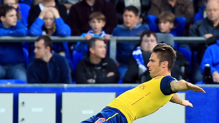 Olivier Giroud celebrates his late equaliser