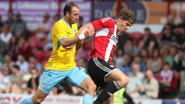 James Tarkowski: Holds off Palace goalscorer Glenn Murray