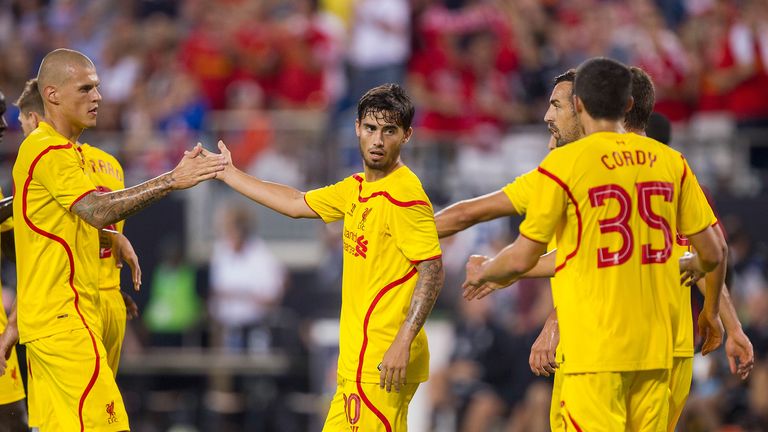 Suso is congratulated by teammates after scoring late on in the 2-0 win over AC Milan