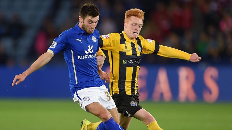 Michael Cain: Leicester man battles with Ryan Woods of Shrewsbury