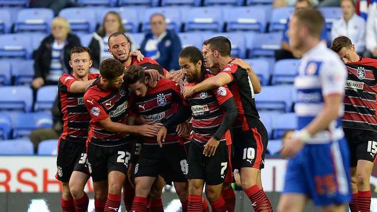 Butterfield: Mobbed after goal at Reading