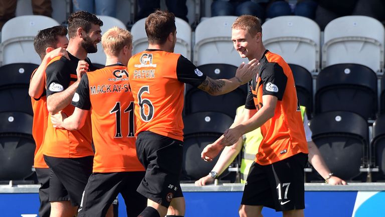 Chris Erskine (right) celebrates with team-mates after opening the scoring against St Mirren