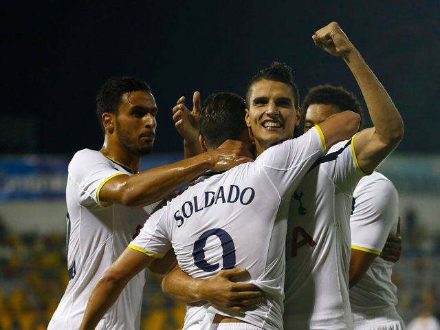Erik Lamela celebrates Spurs' equaliser with goalscorer Roberto Soldado